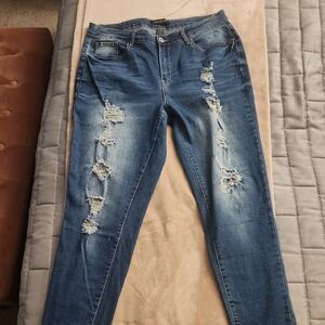 Distressed Blue Denim Jeans